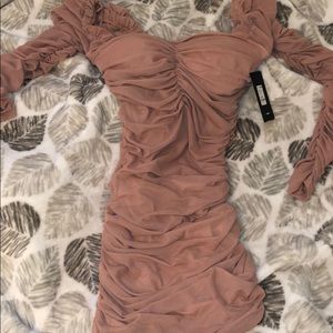 Mariah nude ruched dress from Fashion Nova.